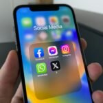 Smartphone showing social media app icons